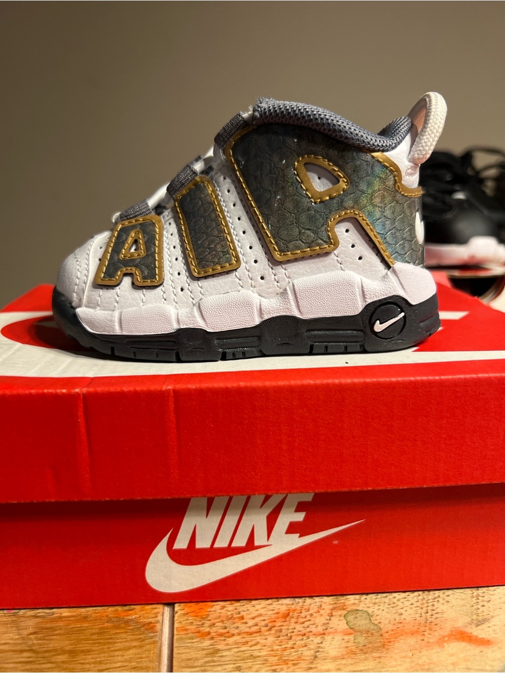 Nike Kids White, Black and Gold 'AIR' Lettering Sneaker